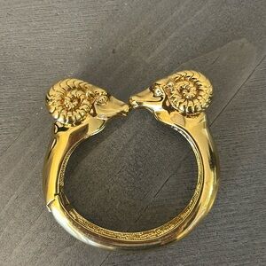 Gold Tory Burch Rams head bracelet